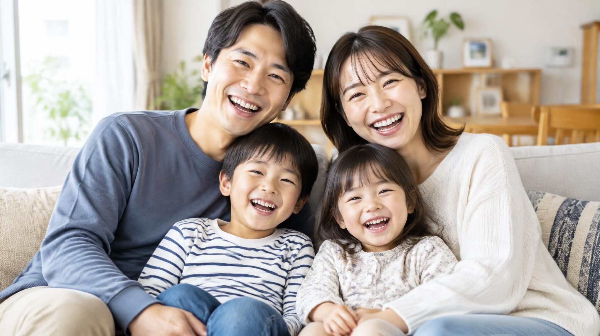 Japanese family smiling together at home