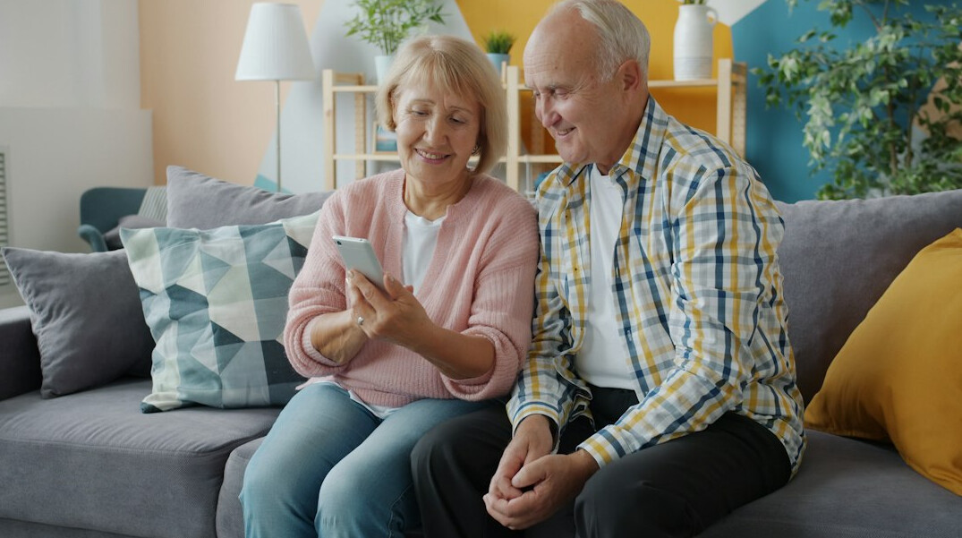 elderly couple relaxing at home